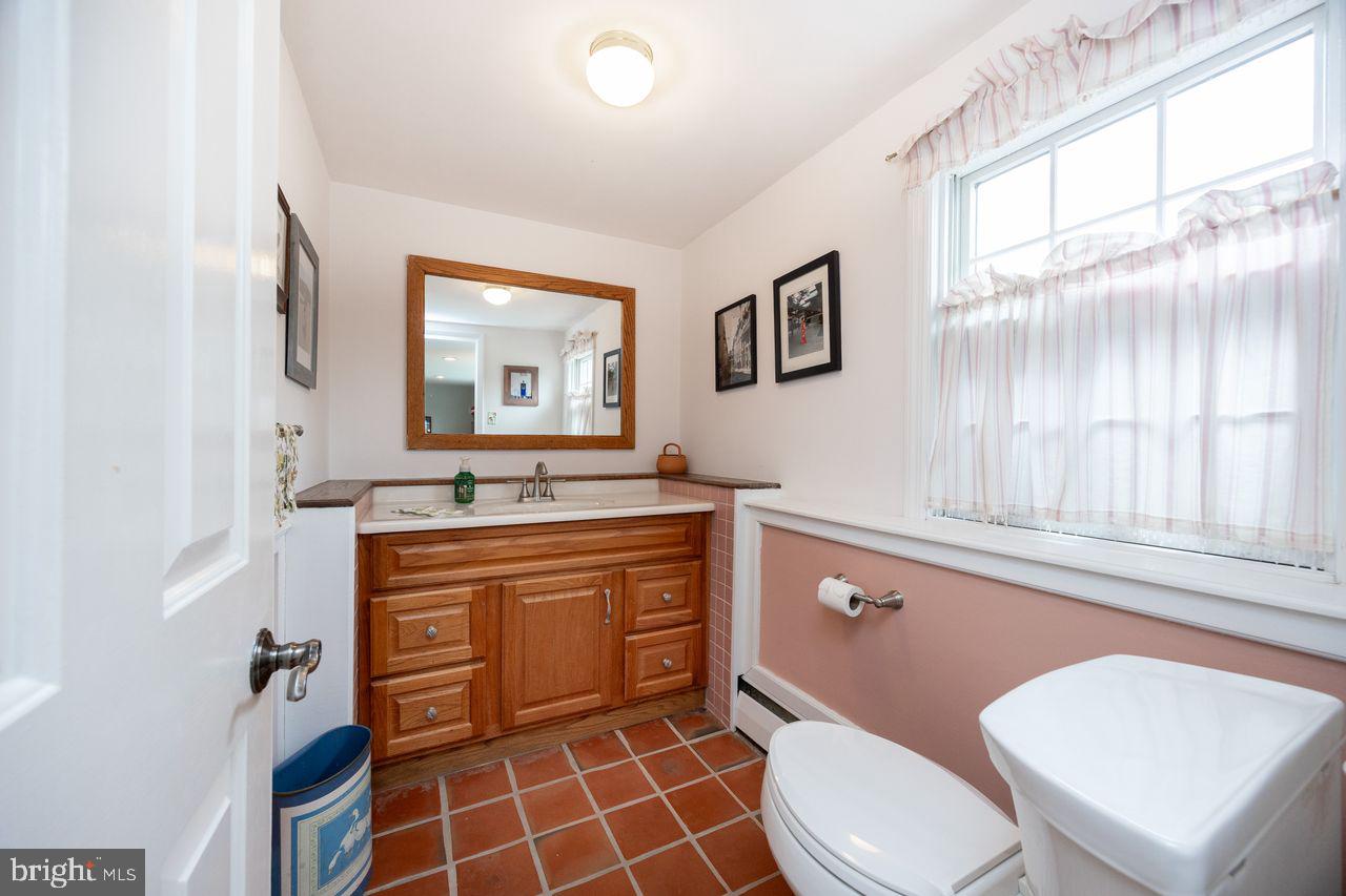 36 Long Lane Malvern, PA 19355 - Photo 18 of 44 a spacious bathroom with a toilet a sink and a mirror