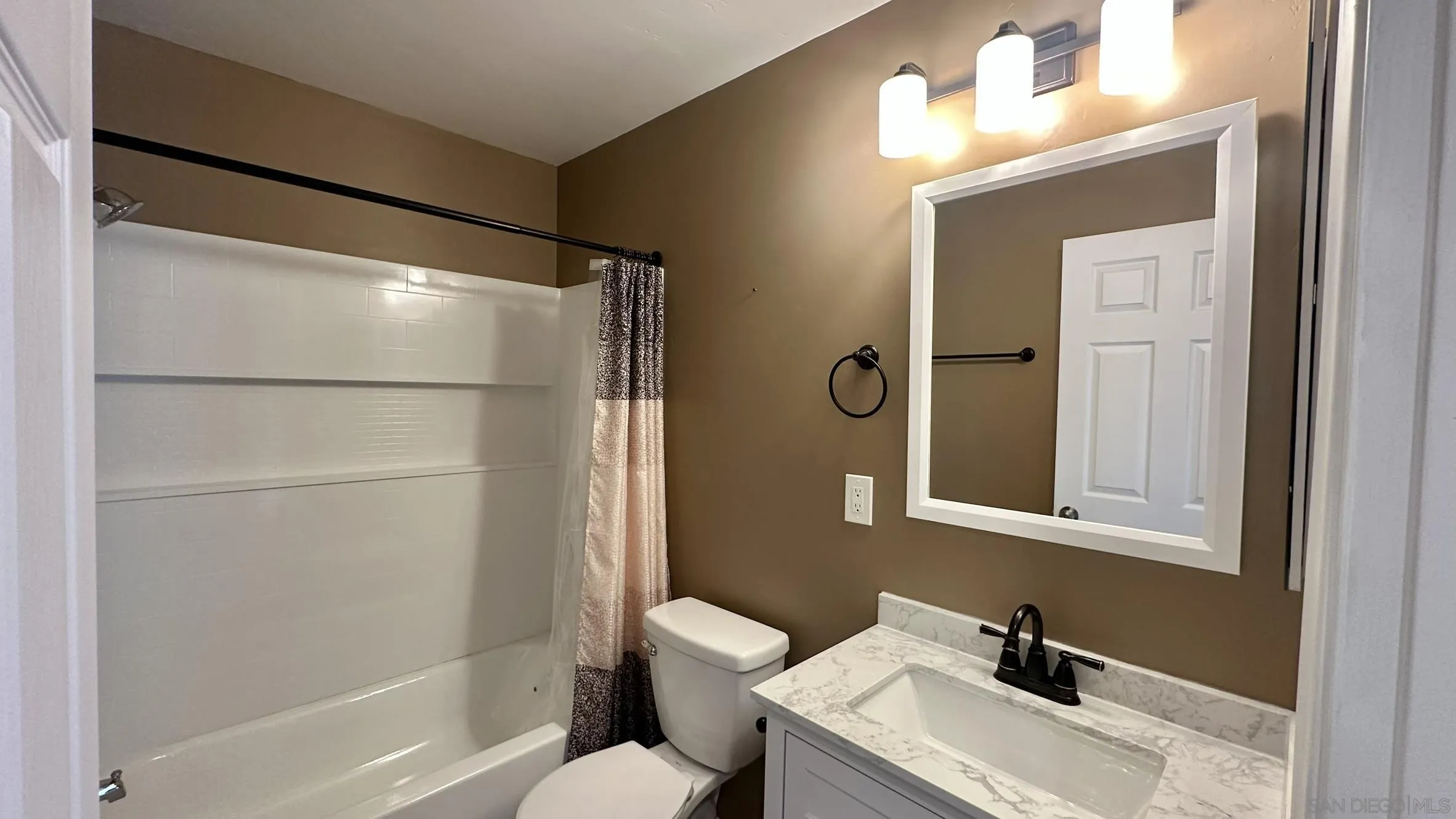 16142 Dartolo Road Ramona, CA 92065 - Photo 18 of 31 a bathroom with a sink toilet and shower
