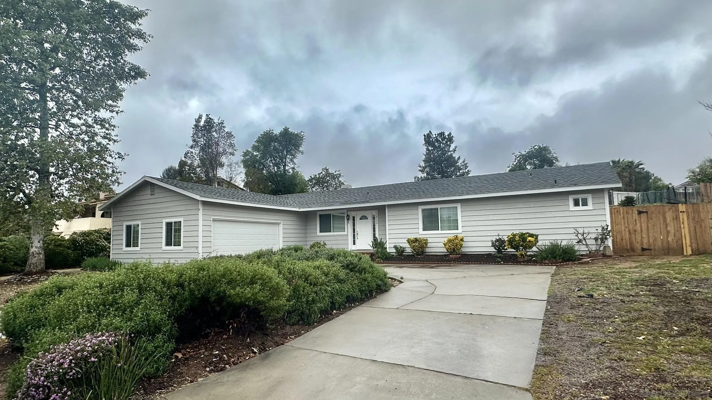16142 Dartolo Road Ramona, CA 92065 - Photo 4 of 31 a view of a house with a patio