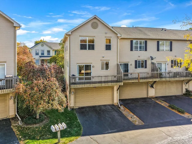 a front view of house with yard outdoor seating and barbeque oven