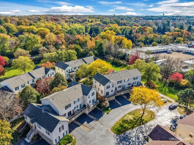 an aerial view of a house with a garden