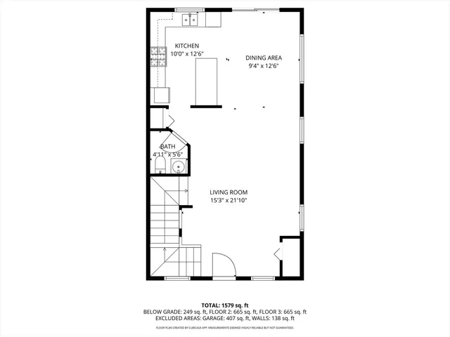 a picture of a bench in front of a wall