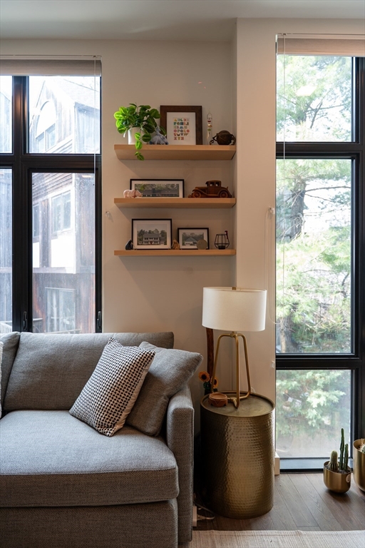 2 Sinclair Road, Unit 202 Boston, MA 02134 - Photo 8 of 23 a living room with furniture and a large window