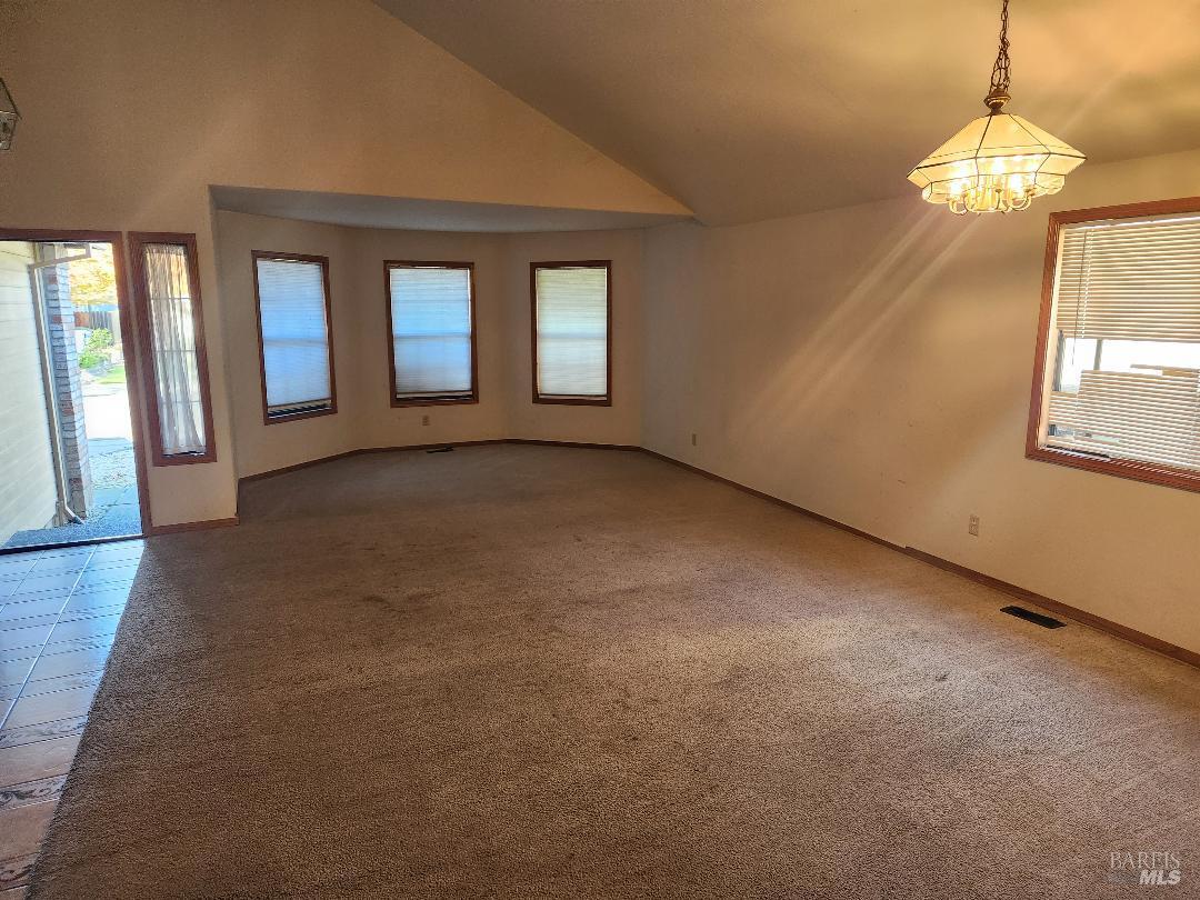 466 Walten Way Windsor, CA 95492 - Photo 4 of 7 an empty room with windows
