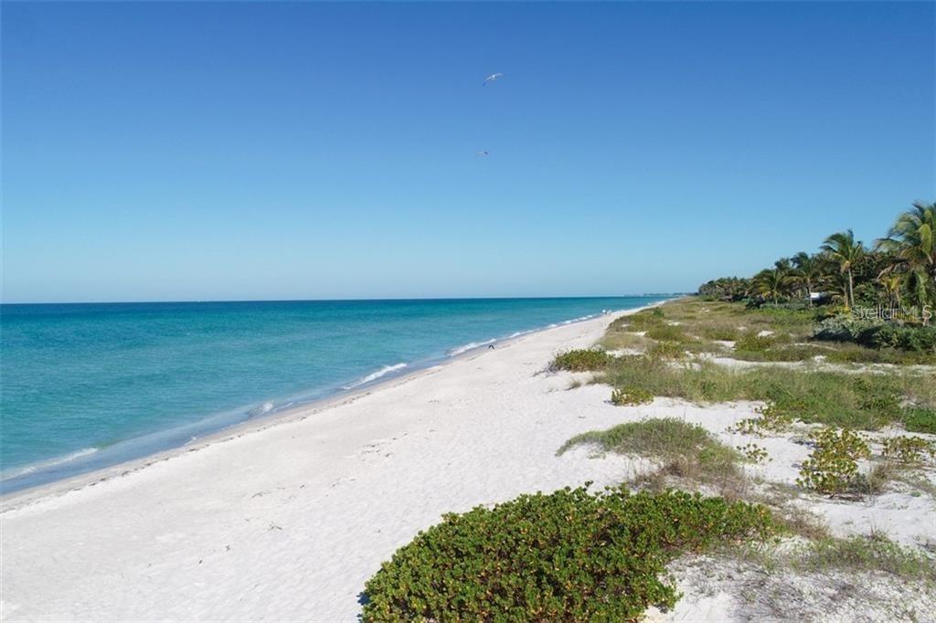 540 Neptune Avenue, Unit 7 Longboat Key, FL 34228 - Photo 6 of 12 a view of ocean view with beach