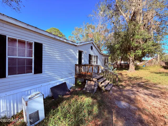 a view of a house with a patio