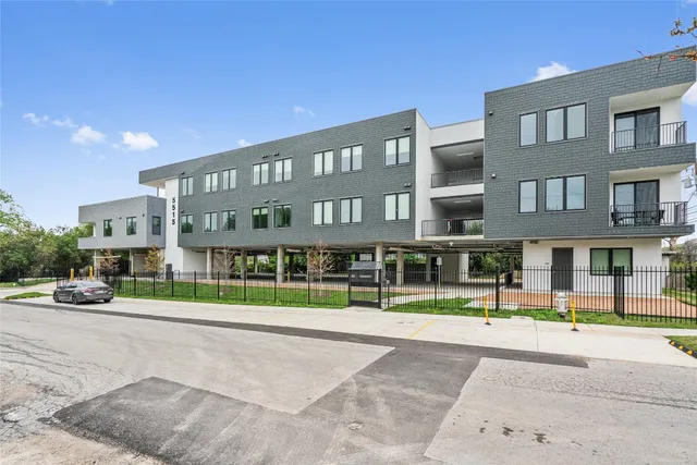 a view of swimming pool with seating space