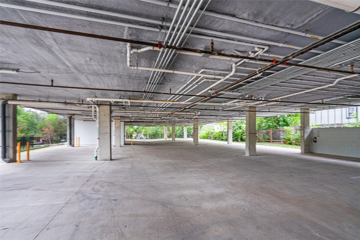 5515 Humming Bird Lane, Unit 207 Austin, TX 78745 - Photo 16 of 32 a view of a room with wooden walls