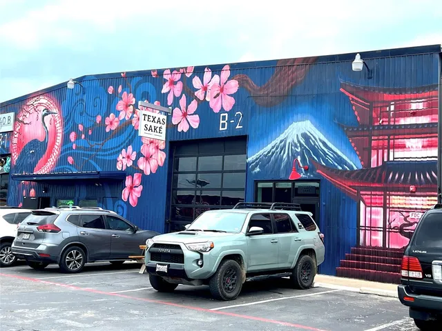 a view of a cars parked in front of a building