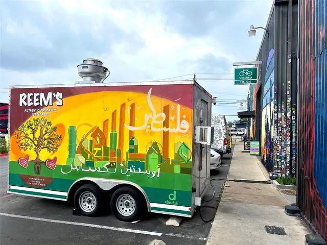 a view of car parked in front of a building