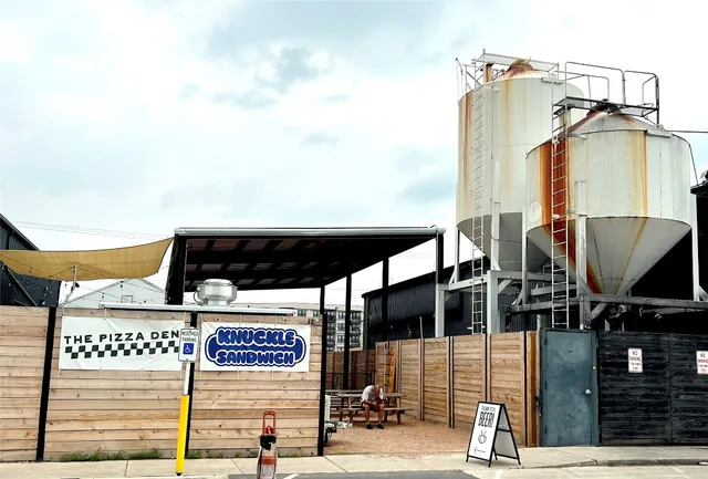 a bench sitting in front of a building