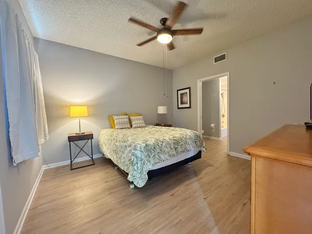 a bathroom with a double vanity sink and mirror