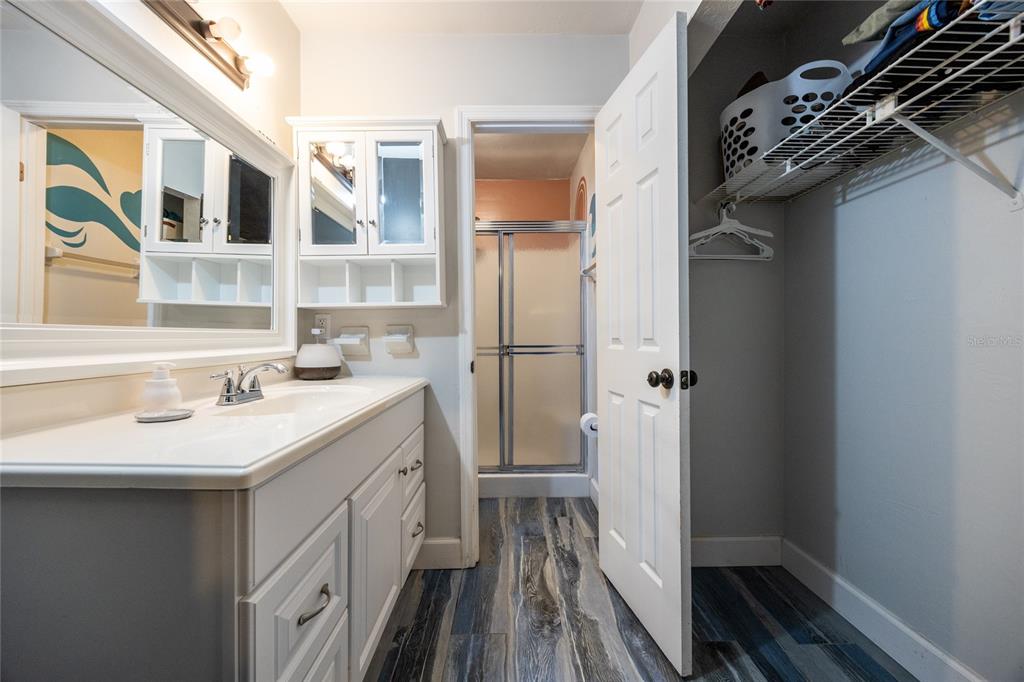 2116 Southwest 73rd Street Gainesville, FL 32607 - Photo 25 of 35 a kitchen with a sink and refrigerator