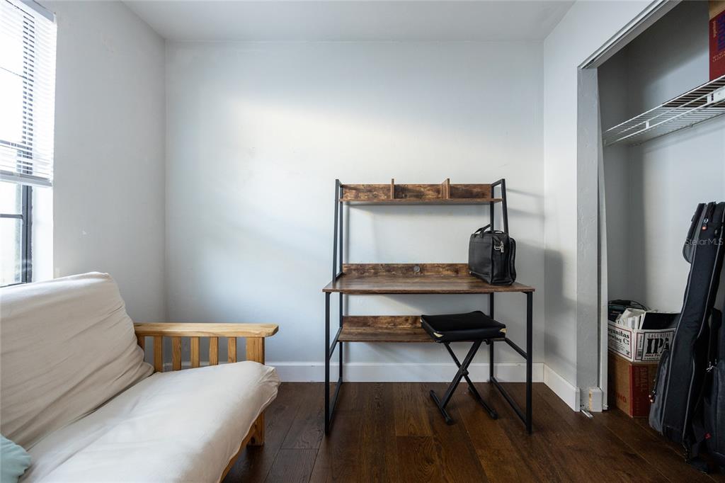 2116 Southwest 73rd Street Gainesville, FL 32607 - Photo 32 of 35 a living room with furniture and a window