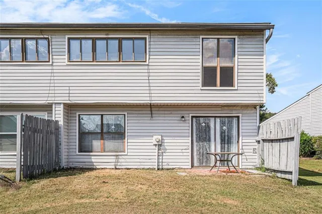 a house view with a outdoor space
