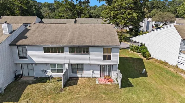 a aerial view of a house with a patio