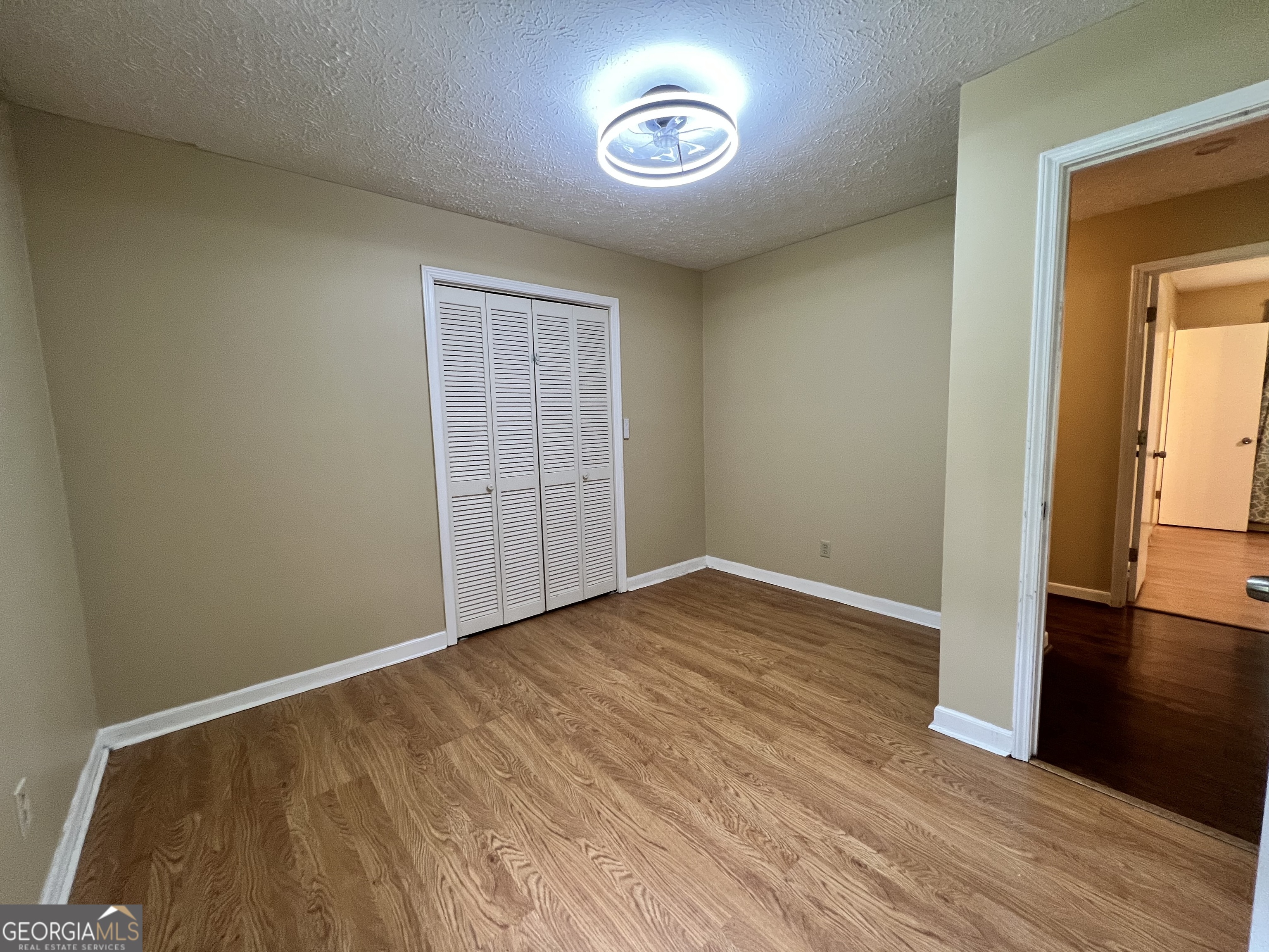 32 Ford Drive Southeast Rome, GA 30161 - Photo 21 of 49 an empty room with wooden floor and windows