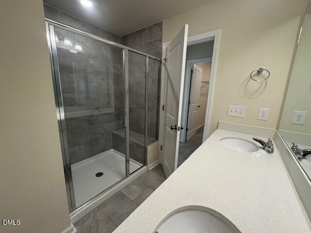 448 Glen Clova Drive Raleigh, NC 27603 - Photo 14 of 23 a bathroom with a shower and a sink