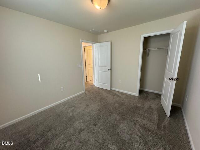 448 Glen Clova Drive Raleigh, NC 27603 - Photo 17 of 23 an empty room with windows and entrance