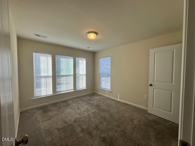 448 Glen Clova Drive Raleigh, NC 27603 - Photo 19 of 23 a view of an empty room with a window