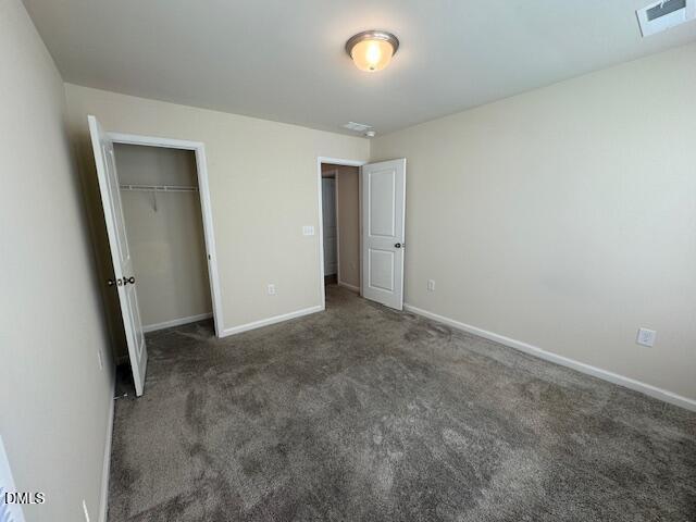 448 Glen Clova Drive Raleigh, NC 27603 - Photo 20 of 23 an empty room with a mirror