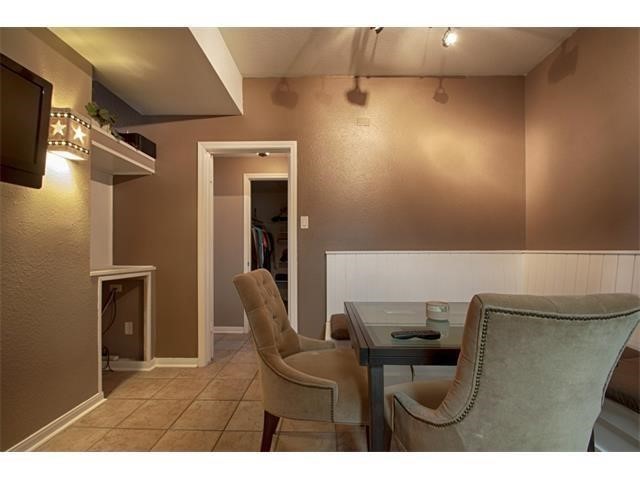 2529 Rio Grande Street, Unit 37 Austin, TX 78705 - Photo 16 of 19 a balcony with chairs and a potted plant