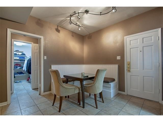 2529 Rio Grande Street, Unit 37 Austin, TX 78705 - Photo 17 of 19 a view of a dining room with furniture and wooden floor