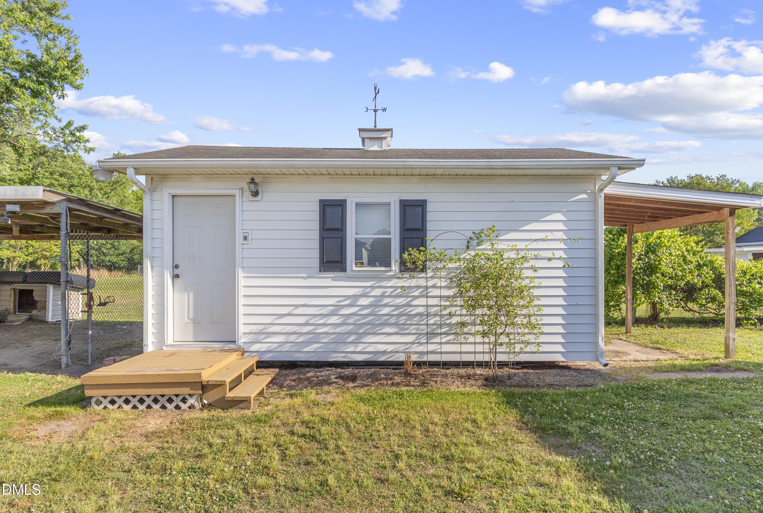 199 Iris Bryant Road Erwin, NC 28339 - Photo 29 of 33 a front view of a house with a yard