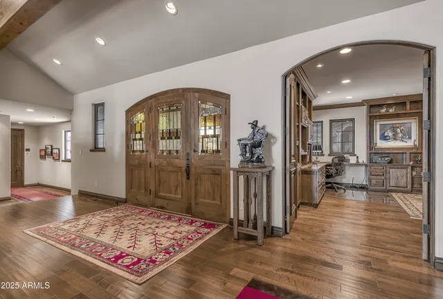 a view of a hallway view with staircase