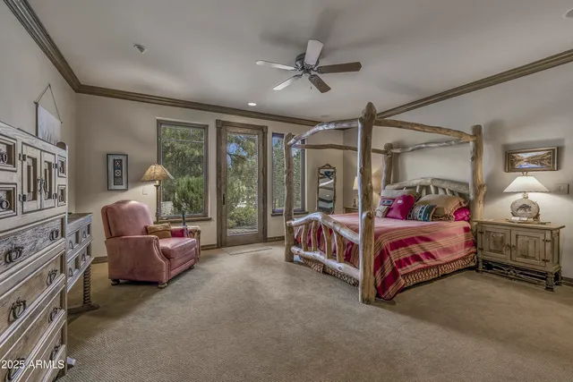 a bathroom with a granite countertop double vanity sink and mirror