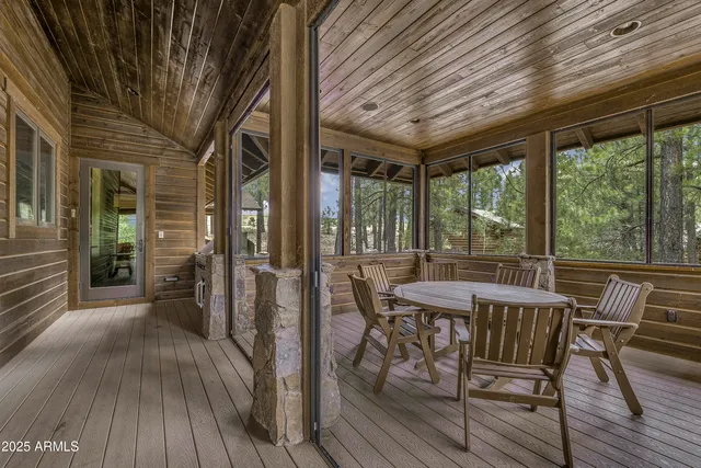 a view of porch with a backyard of a house