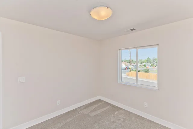 an empty room with window