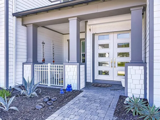 a front view of a house with a porch