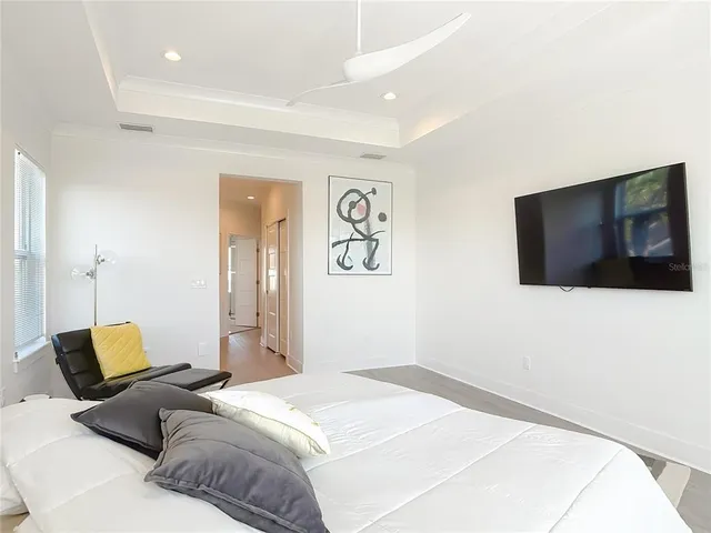 a hallway with chairs and closet