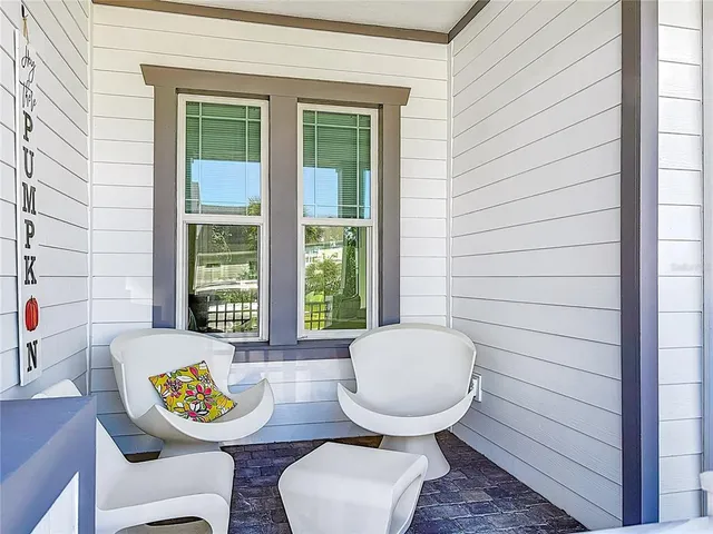 a outdoor dining space with furniture