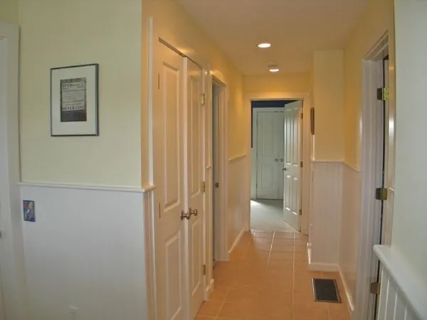 a view of walk in closet with bathroom