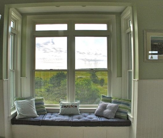 76 Mattakesett Way Edgartown, MA 02539 - Photo 6 of 28 a view of lot of living room with furniture and window