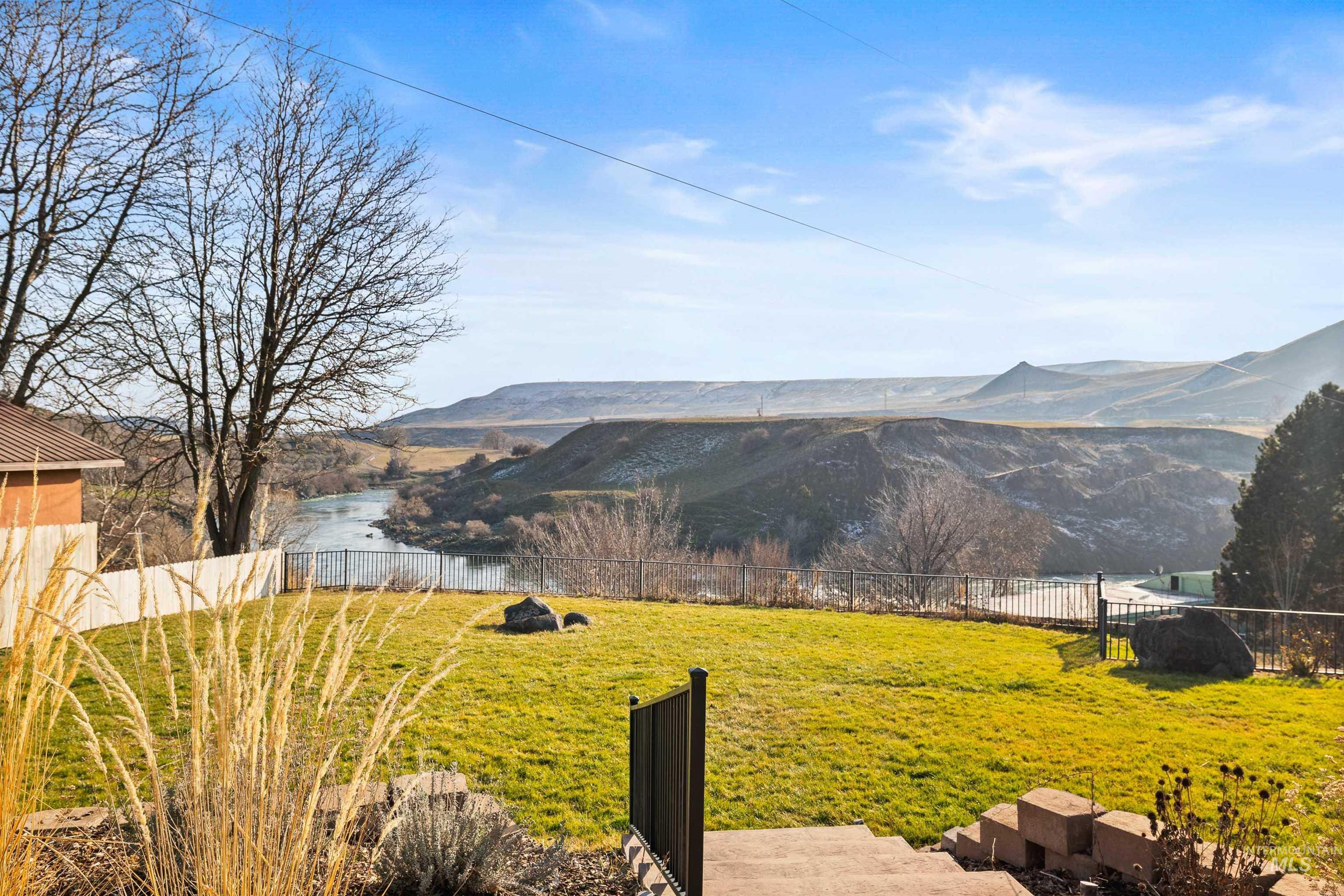 853 Pottery Road Bliss, ID 83314 - Photo 2 of 50 View of mountain backdrop with a large body of water