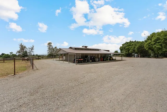 a house view with a backyard space