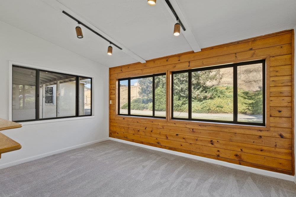 804 Comstock Road Hollister, CA 95023 - Photo 26 of 47 an empty room with large windows