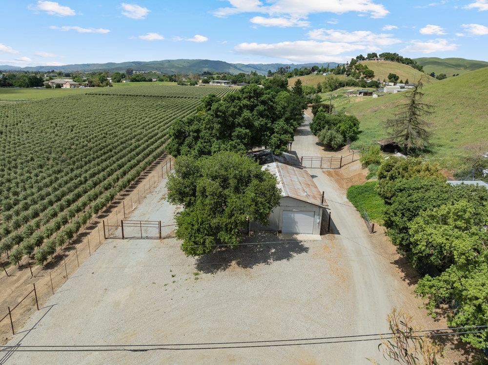804 Comstock Road Hollister, CA 95023 - Photo 4 of 47 an aerial view of ocean with residential houses with outdoor space and trees