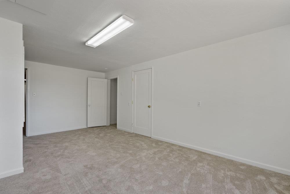 804 Comstock Road Hollister, CA 95023 - Photo 42 of 47 a view of an empty room with a window