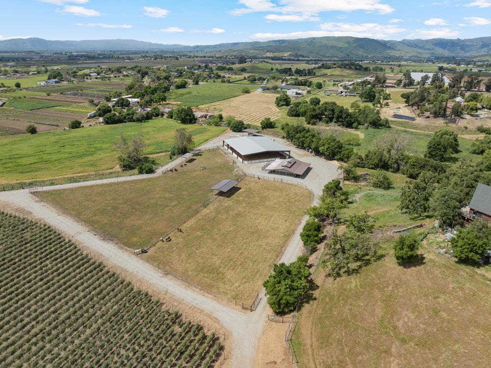 804 Comstock Road Hollister, CA 95023 - Photo 6 of 47 an aerial view of residential houses with outdoor space