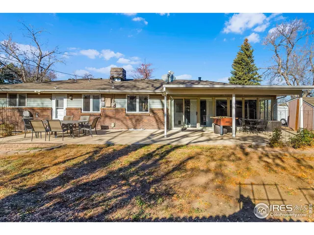 a view of a house with a swimming pool