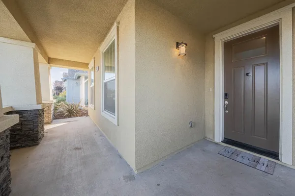 a view of hallway with livingroom