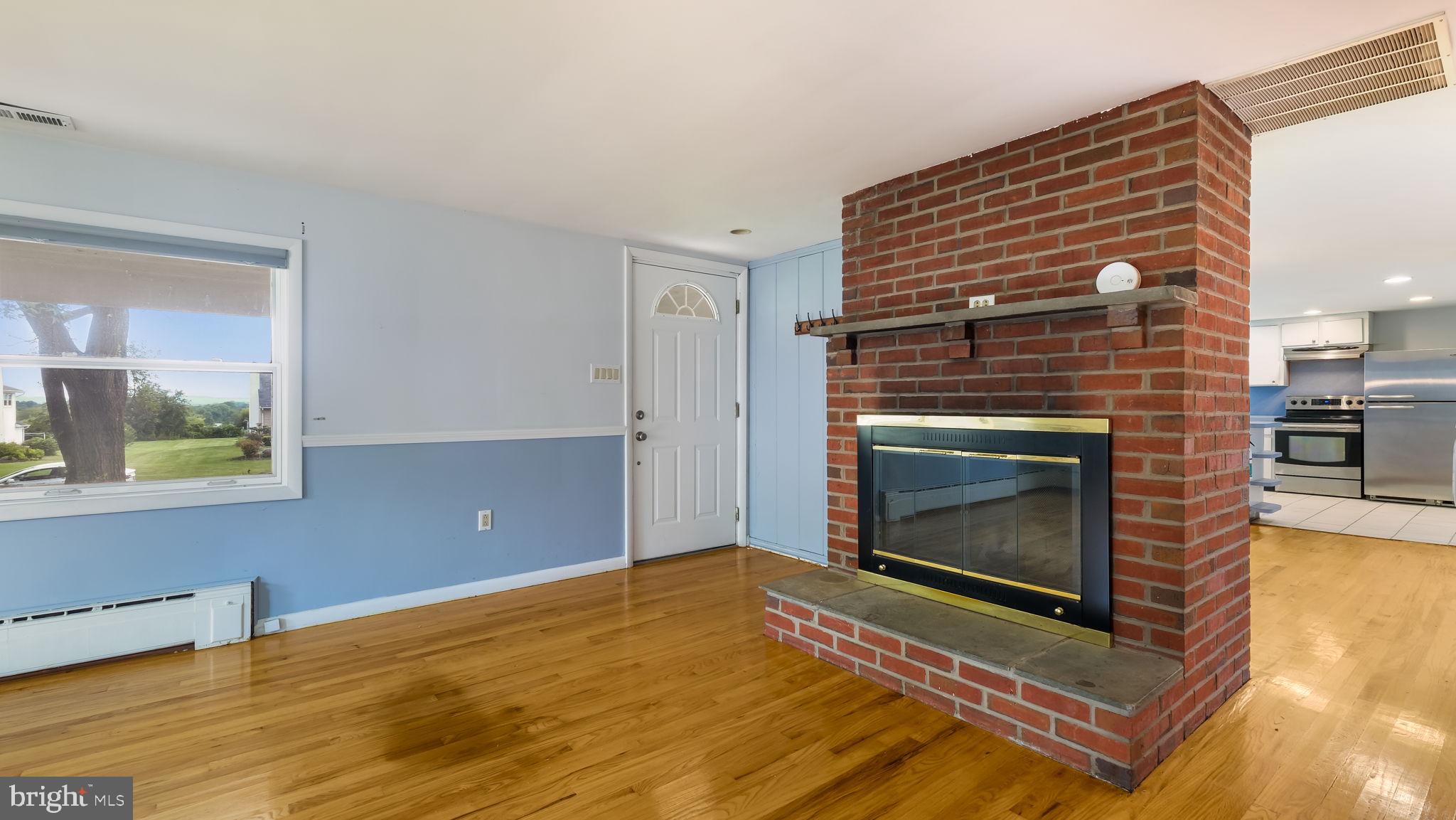 736 Towerview Drive Newtown, PA 18940 - Photo 3 of 19 living room fireplace