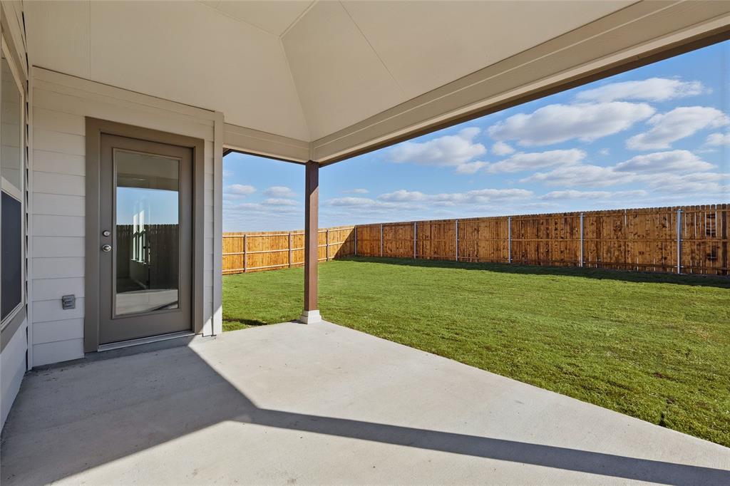 2529 Rivers W Road Anna, TX 75409 - Photo 20 of 22 Fenced backyard with a patio area
