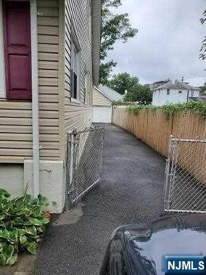 24 Washington Place, Unit 2 Teaneck, NJ 07666 - Photo 5 of 12 a view of a balcony with a swing