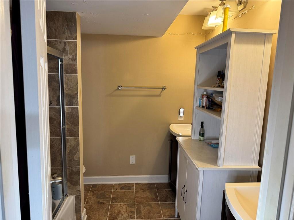 6851 Roswell Road, Unit O24 Sandy Springs, GA 30328 - Photo 9 of 10 a bathroom with a sink and toilet