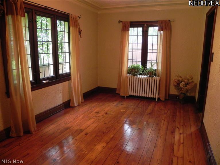994 Canfield Road Youngstown, OH 44511 - Photo 3 of 14 Formal Dining Room with beautiful wood flooring and leaded windows.